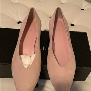 Pointy toe pink suede pumps